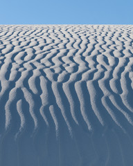 Ripples in the white gypsum sand of White Sands National Park in New Mexico