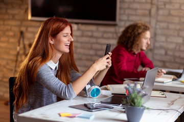 Young people working in modern office