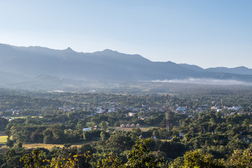 View of the small town which located in the plains between the mountains.