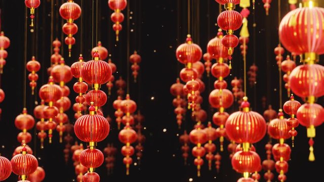 Chinese new year red paper latern decoration moving in space with falling gold particles. Chinese new year festive background. Loop 4K animation.