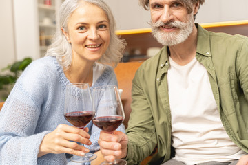 Two mature people looking at the camera