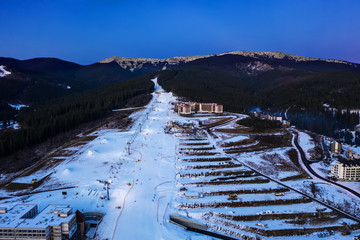 Obraz premium Yaremche. Ukraine. 6 March 2018. Bukovel. Aerial view of the mountains. Carpathians. Winter. Snow.