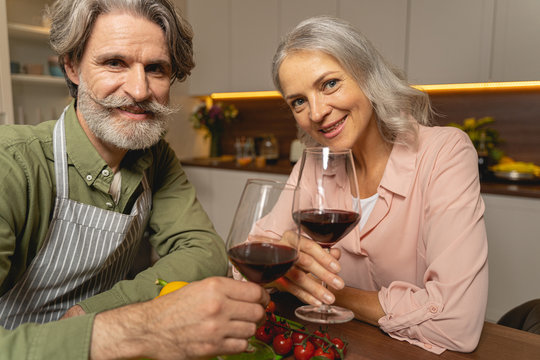 Woman and her husband tasting dry wine