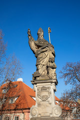 St. Augustinus or Augustine of Hippo Statue, an outdoor sculpture on the north side of Charles Bridge over the river Vltava