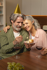 Woman sitting with her husband at the table