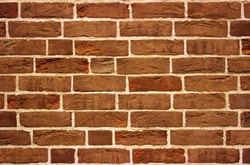  Brown brickwork close up. Wall decoration of the building with decorative stone.