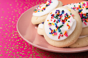 Sprinkle cookies with vanilla icing