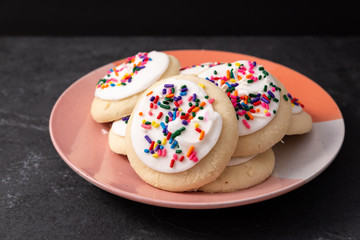 Sprinkle cookies with vanilla icing