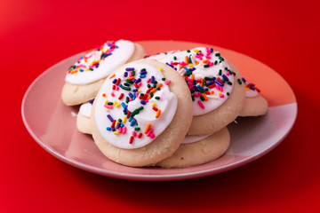 Sprinkle cookies with vanilla icing
