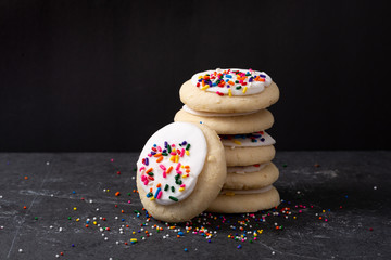 Sprinkle cookies with vanilla icing