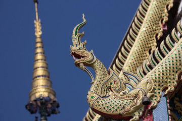 Fototapeta na wymiar Golden naga head in lanna thai temple