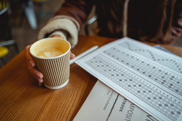 Close up of female hand that holding cup