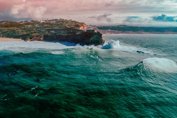 Professional surfer rides a giant wave the legendary big wave