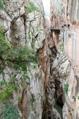 Caminito del Rey hiking trail through a deep narrow gorge. Malaga Spain