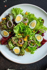 healthy salad corn, quail eggs, leaves mix (green vitamins) menu concept. food background. top view. copy space