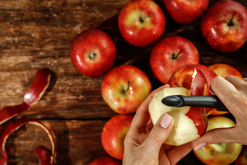 Apples and woman hands. Free space for your decoration. 