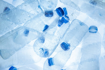Abstract background of plastic bottles (Polyethylene Terephthalate or PET bottle). Global warming...