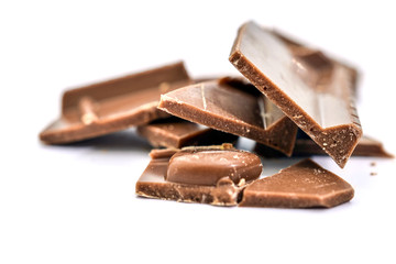 sweet chocolate pieces on white ,