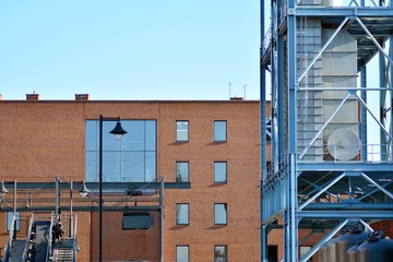 The windows of a modern building for offices. Business buildings architecture.