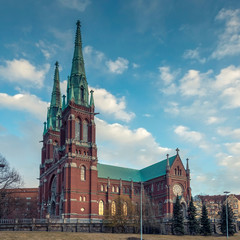 Fototapeta na wymiar Church of St. John Lutheran Neo-Gothic style temple in the Finnish capital Helsinki 