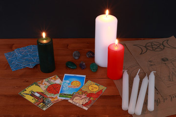 occult magic symbolism and ritual with runes and Tarot cards