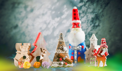 handmade toys and holiday dacorations at frosty colorful winter background