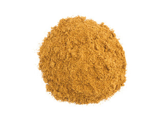 A round bunch of masala powder on white isolated background. Indian cuisine, ayurveda, naturopathy concept