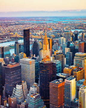 Panoramic view on Midtown district of Manhattan in New York, NYC. East river and Queensboro Bridge in Long Island City. Skyline, USA. American architecture building. Aerial Panorama of Metropolis.