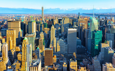 Aerial panoramic view. on Midtown district of Manhattan in New York. Hudson river is on the background. Metropolitan City skyline, USA. American architecture building. Panorama of Metropolis NYC