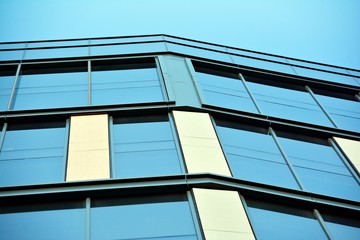 The windows of a modern building for offices. Business buildings architecture.