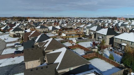 Low Angle Aerial Over House Brownstone Redstone Rooftops Residential Neighborhood In Winter
