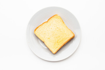 Fototapeta na wymiar A couple of toasted slice bread with jam on a plate