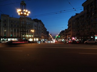Fototapeta na wymiar Kiev Leo Tolstoy Square, evening lights, street traffic, blue hour evening.
