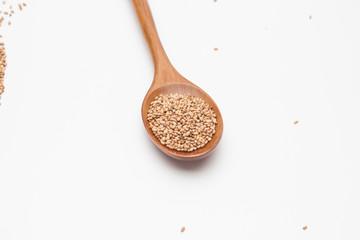 Sesame seeds on white background