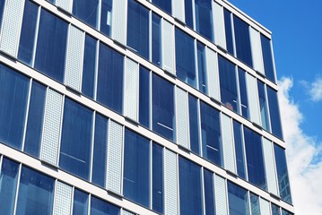 Obraz premium The windows of a modern building for offices. Business buildings architecture.