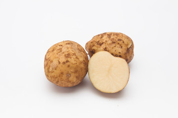 Fototapeta na wymiar Sliced raw potatoes on a white background