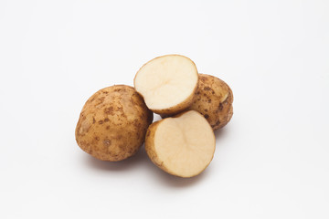 Fototapeta na wymiar Sliced raw potatoes on a white background