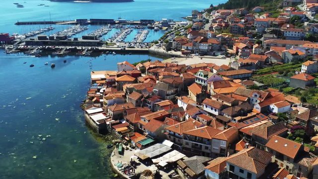 Aerial view of the port and bay around the seaside town of Combarro. Galicia, Spain