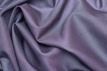 Background texture of suit fabric, gray in a small square. Beautiful luxury background. Twisted beautifully smooth elegant fabric.