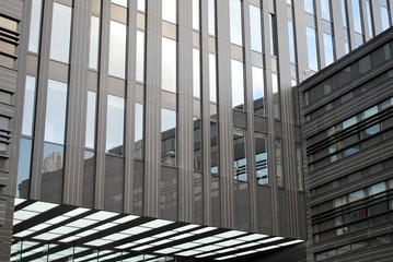 Obraz premium The windows of a modern building for offices. Business buildings architecture.