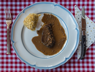 HIRSCHBRATEN MIT KNÖDEL . ROASTED STAG WITH DUMPLING