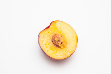 Sliced peaches on a white background