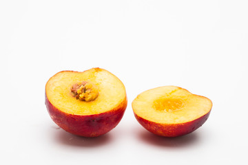 Sliced peaches on a white background