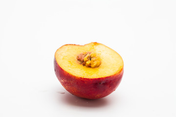 Sliced peaches on a white background