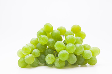 Bunch of green grapes isolated on a white 