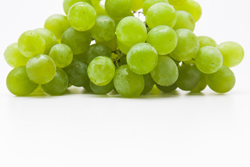 Bunch of green grapes isolated on a white 