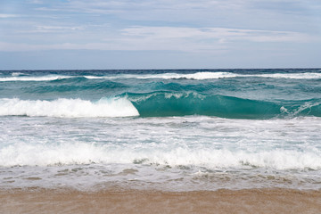 Sandy coast with great waves