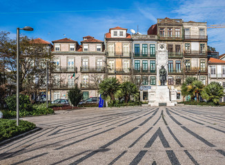 Fototapeta na wymiar Square of Carlos Alberto with a monument for victims of World War I in Porto, Portugal