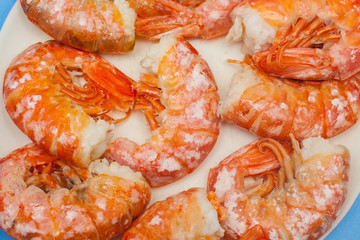 Fresh cooked lagoustines on the plate. Seafood menu.