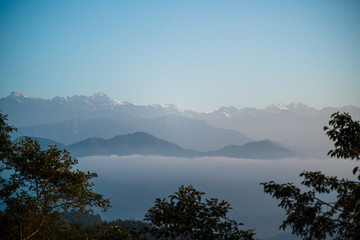 Sunset above mountain in valley Himalayas mountains